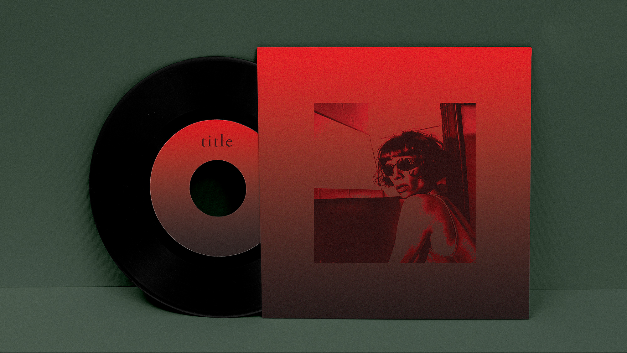 Woman wearing glasses leaning on a sink, standing in front of a mirror on a red-to-black gradient vinyl cover